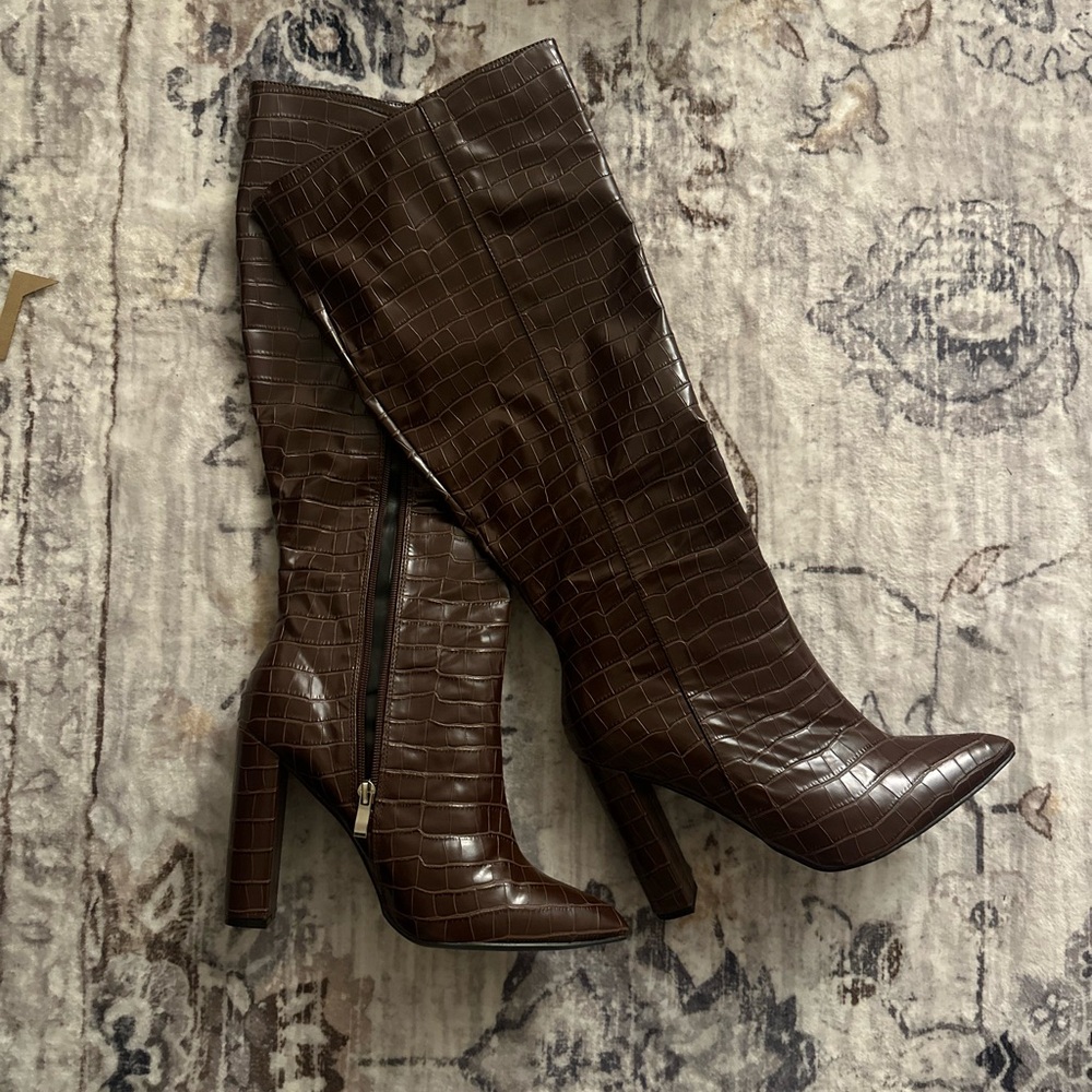 Brown knee high boots